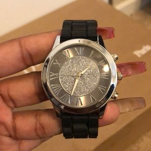 Cute black watch with silver face